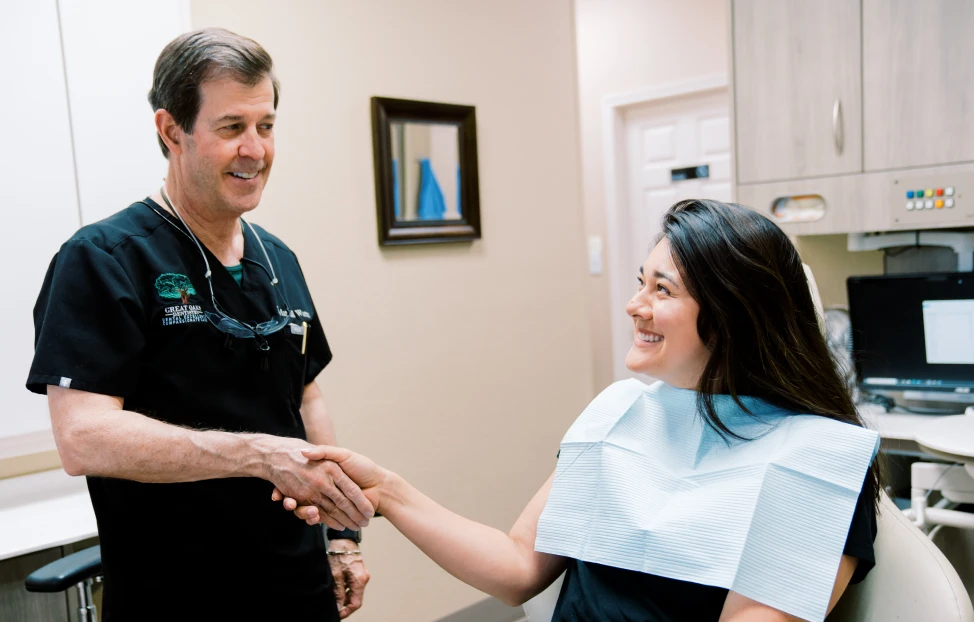 Dr. Marshall Warren with a satisfied patient at Great Oaks Dentistry in New Braunfels